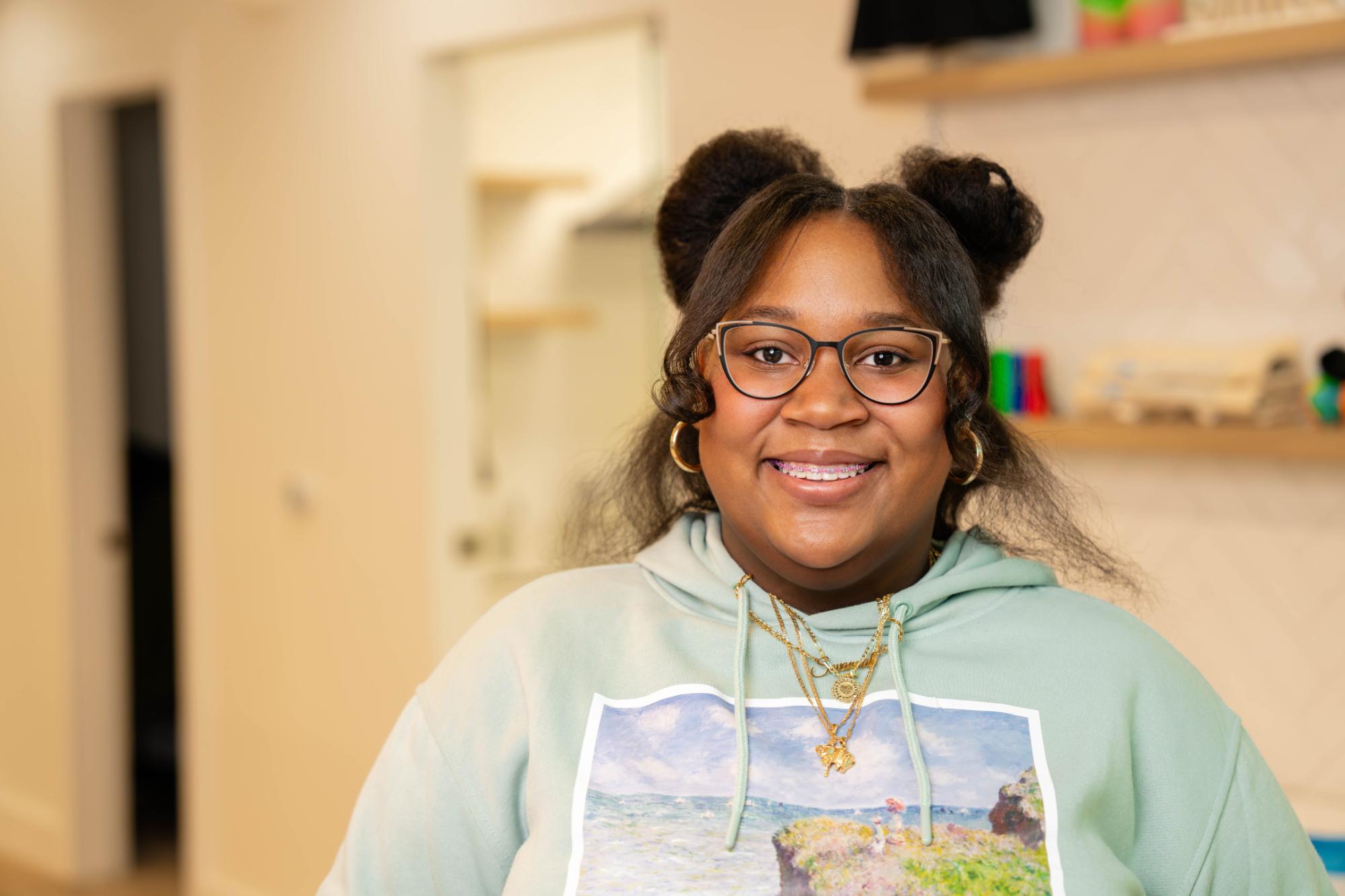 teen smiling during orthodontic visit